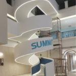 Case Study: Design and Construction of a Double-Height Spiral Steel Staircase for Summit Ceramic Flagship Showroom