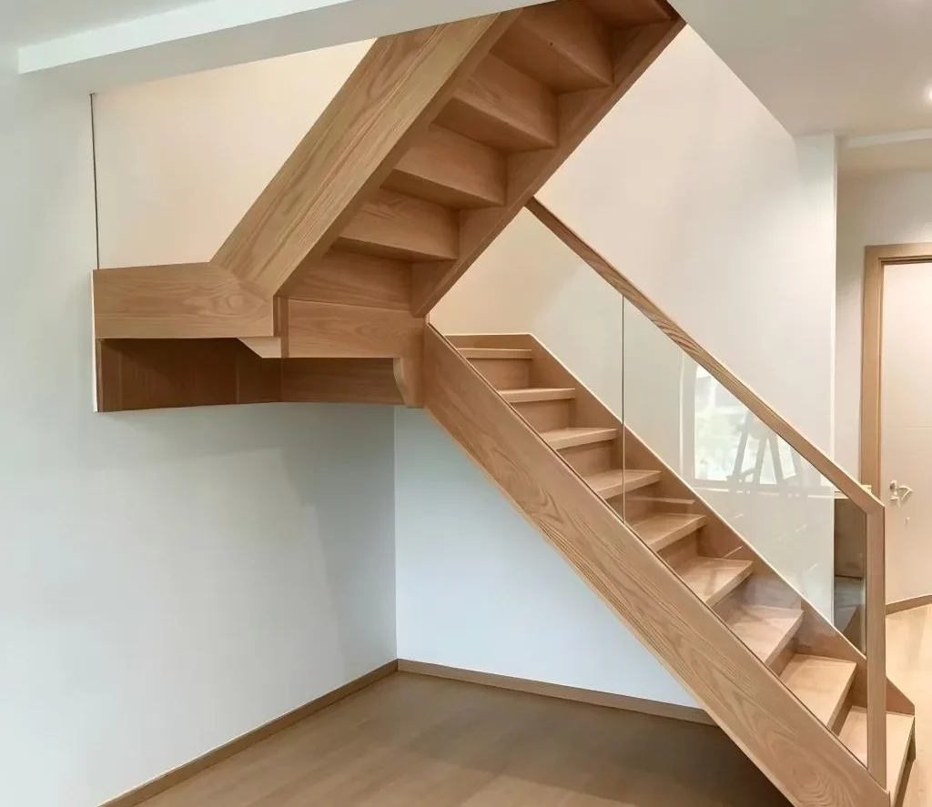 Prefabricated wooden staircases framework with pre-cut timber stringers in luxury apartment