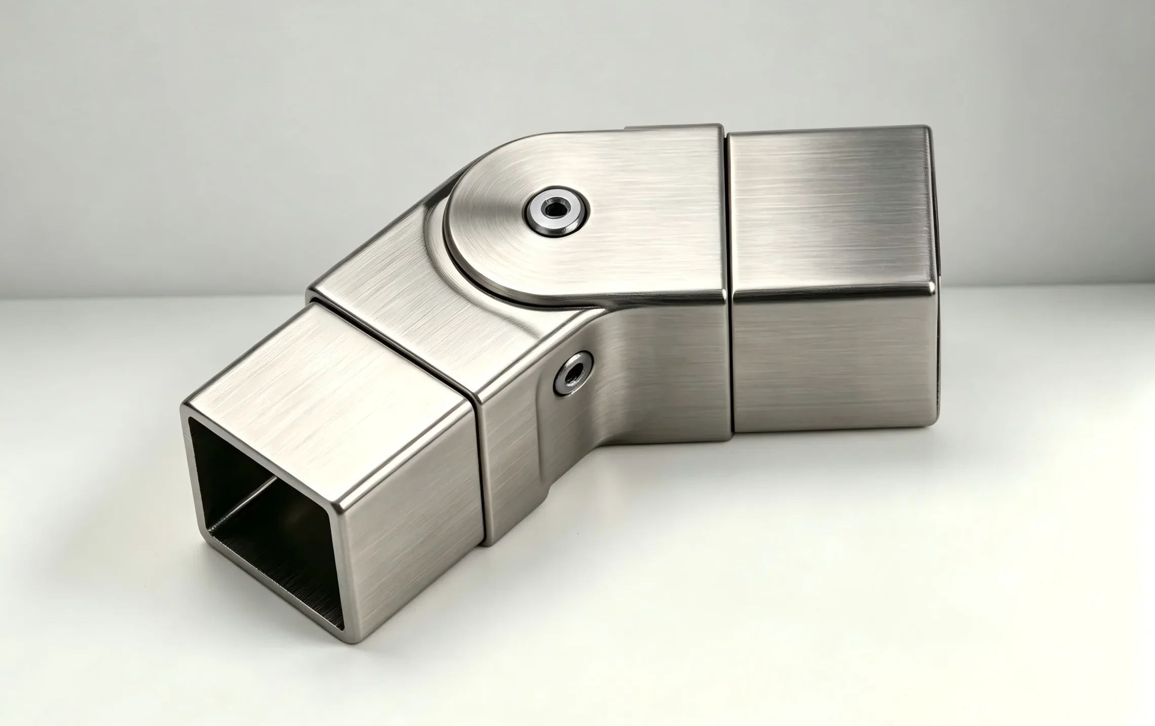 Adjustable elbow connector bracket for stainless steel handrail tubing